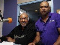 Former Surinamese dictator Desi Bouterse, head of the opposition National Democratic Party (NDP), pose with his son Dino during a live radio show in Paramaribo
