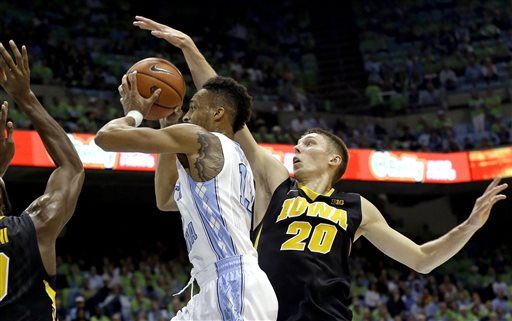 J.P. Tokoto, Jarrod Uthoff