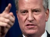 New York City Mayor Bill de Blasio speaks during a news conference to announce a tentative contract agreement with the Uniformed Superior Officers Coalition at City Hall in New York