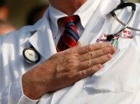 doctor-hand-on-heart-reuters