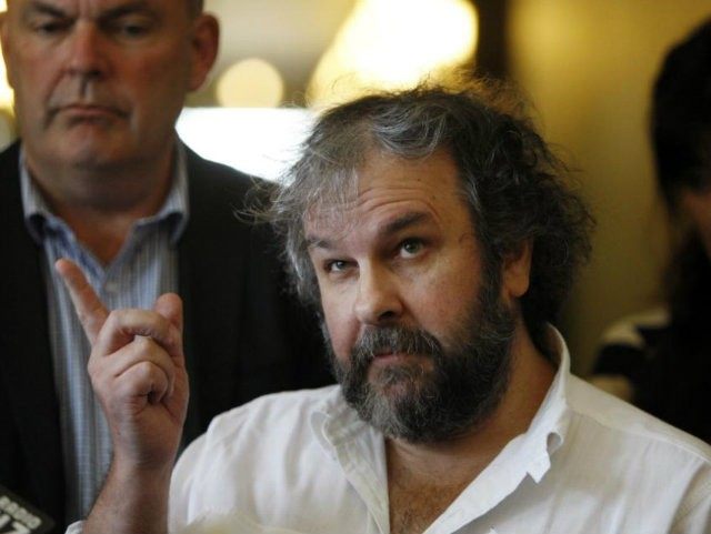 Movie director Peter Jackson talks to reporters at an event to promote the New Zealand film industry