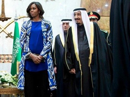 President Obama and first lady Michelle Obama participate in a delegation receiving line with new Saudi King Salman bin Abdul Aziz, fifth from left, in Riyadh, Saudi Arabia. The president and first lady have come to expresses their condolences on the death of the late Saudi king Abdullah bin Abdul Aziz al-Saud.