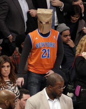 Photos: Fans hide faces behind paper bags as hapless Knicks lose 14th straight game
