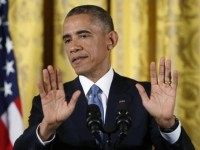 U.S. President Obama answers questions during news conference in the East Room of the White House in Washington