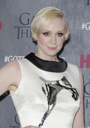Gwendoline Christie walks the runway at Paris Fashion Week