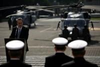 U.S. Ambassador Earl Anthony Wayne speaks at the presentation of three new UH-60M Black Hawk helicopters at the Navy's headquarters in Mexico City