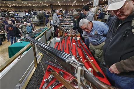 Gun Show AP Photo Philip Kamrass