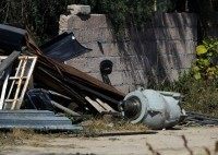 Container reportedly containing radioactive material cobalt-60 that was being sent from a hospital to a radioactive waste-storage center, is seen at a home near where dangerous radioactive medical material was found in a truck in town of Hueypoxtla