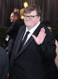 Michael Moore calls for full disarmament of police, wants prisons cleared