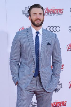 Watch Chris Evans play coy about Lily Collins dating rumors