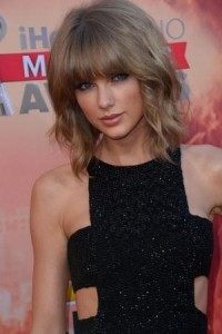 Taylor Swift and Calvin Harris make it official at Haim concert