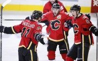 Mikael Backlund, Kris Russell, Joe Colborne