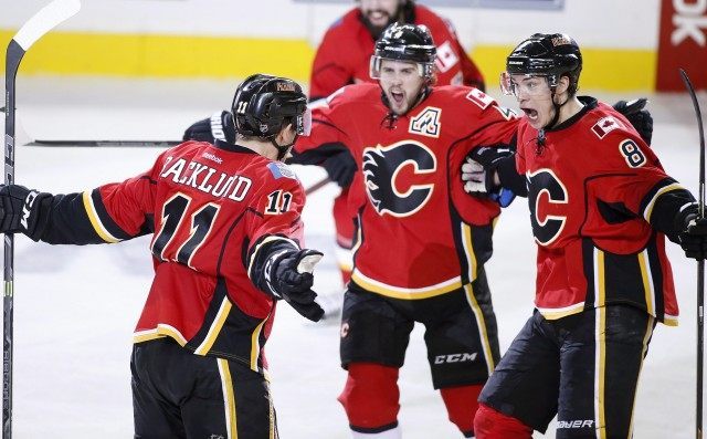 Mikael Backlund, Kris Russell, Joe Colborne