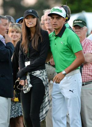 Alexis Randock, Rickie Fowler kiss to celebrate Players win