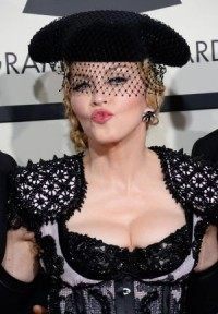 Madonna regrets kissing Drake
