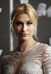 Hailey Baldwin debuts brunette hair at 2015 Met Gala