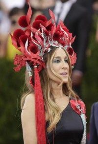 Sarah Jessica Parker wears large fiery headdress to the Met Gala