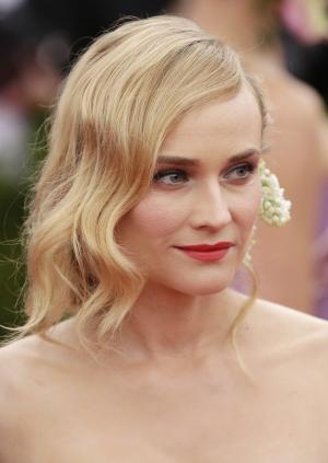 Diane Kruger shares topless vacation photo
