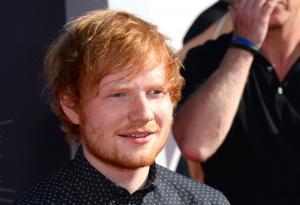 Ed Sheeran tears up when couple gets engaged at his concert