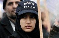 A demonstrator joins the "United Against