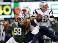 Jason Babin Tom Brady AP
