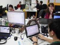 Tech workers (Oli Scarff / Getty)
