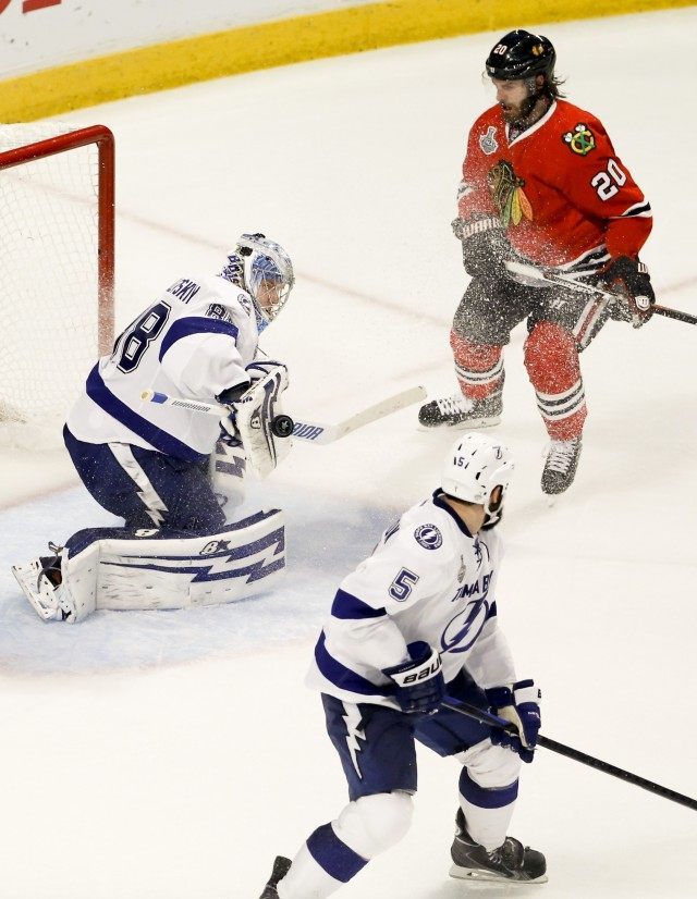 Brandon Saad, Jason Garrison, Andrei Vasilevskiy