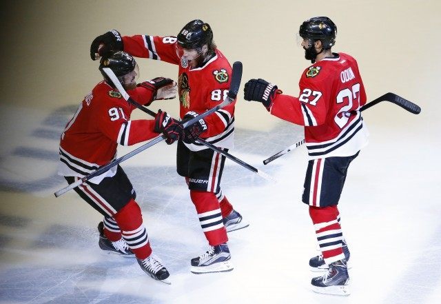 Johnny Oduya, Patrick Kane, Brad Richards