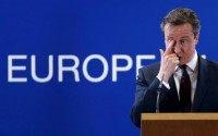 Britain's PM Cameron addresses a news conference during a EU leaders summit in Brussels