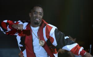 Diddy stumbles during surprise Bad Boy performance at BET awards, hints at 'family' tour