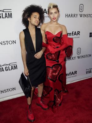 Miley Cyrus's Caitlyn Jenner artwork sells at AmfAR gala