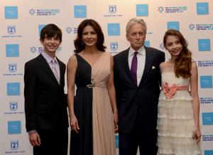 Michael Douglas, Catherine Zeta-Jones walk red carpet with their kids