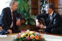 Russian Prime Minister Vladimir Putin (L