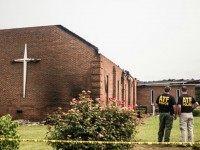 Investigators with the Bureau of Alcohol, Tobacco and Firearms examine the burned ruins of the Mt. Zion AME Church July 1, 2015 in Greeleyville, South Carolina. Federal and state agencies are investigating a recent string of church fires in the South that have occured since the church massacre in nearby Charleston, South Carolina. Mt. Zion AME was burned twenty years ago by members of the Ku Klux Klan.