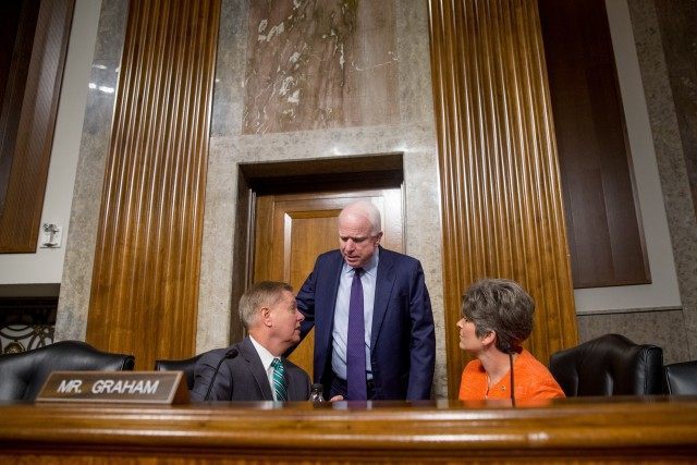 John McCain, Jack Reed, Joni Ernst