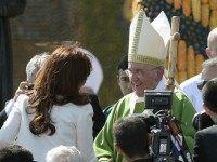 Pope Francis shakes hands with Argentinian President Cristina Fernandez de Kirchner after his mass at Nu Guazu field in the outskirts of Asuncion, Paraguay on July 12, 2015. The Pope finishes Sunday his Latin American tour. AFP PHOTO /JUAN MABROMATA (Photo credit should read J