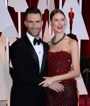 Adam Levine shows off bald head next to Behati Prinsloo
