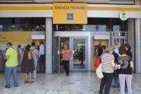 Greek banks reopen as government orders $7.4B payment