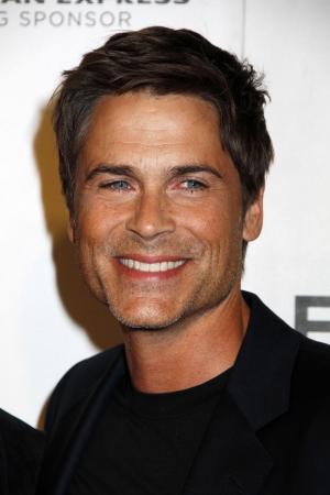 Watch shirtless Rob Lowe lip sync 'The Hills are Alive'