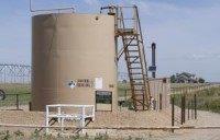 Hess posts loss, but notes production gains