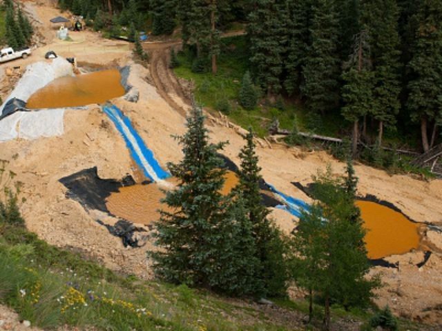 Three settling ponds are used at Cement Creek, which was flooded with millions of gallons of mining wastewater, on August 11, 2015 in Silverton, Colorado. The Environmental Protection Agency uses settling ponds to reduce the acidity of mining wastewater so that it carries fewer heavy metals.