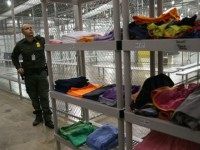 An undocumented immigrant comforts another after U.S. Border Patrol agents surprised and detained them north of the U.S.-Mexico border on August 6, 2015 near Falfurrias, Texas. Border security and illegal immigration are expected to be major issues in the U.S. Presidential debates.