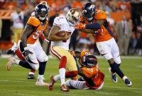 Colin Kaepernick, Shaquil Barrett, T.J. Ward, Danny Trevathan