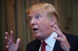 Donald Trump fires campaign adviser for racially 'offensive' Facebook posts