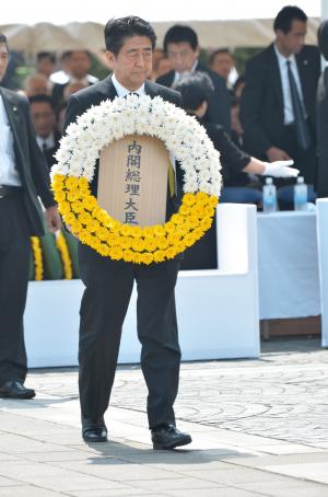 Japan's Abe stops short of apologizing for World War II