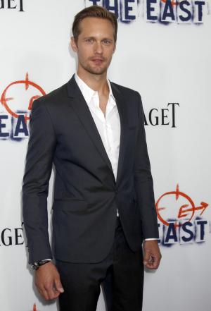 Alexander Skarsgard dresses in drag for film's premiere