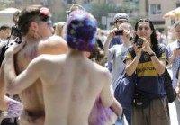 Topless women march for breast-baring rights in New York
