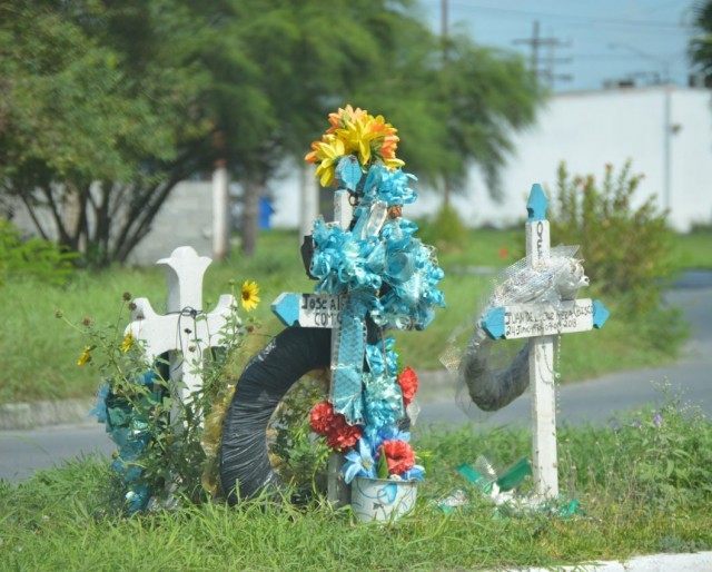 Crosses placed on city streets where cartel members have died.