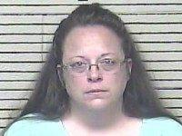 This Thursday, Aug. 3, 2015 photo made available by the Carter County Detention Center shows Kim Davis. The Rowan County, Ky. clerk went to jail Thursday for refusing to issue marriage licenses to gay couples, but five of her deputies agreed to comply with the law, ending a two-month standoff.