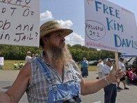 Coleman Colston of Henry County, Ky., joins in the protest in support of jailed Rowan county cerk Kim Davis at the Carter County Detention Center in Grayson, Ky., Tuesday, Sept. 8, 2015. After five days behind bars, Davis was ordered released from jail Tuesday by the judge who locked her up for refusing to issue marriage licenses to gay couples. TIMOTHY D. EASLEY — AP Photo
Read more here: http://www.kentucky.com/2015/09/08/4025677/judge-releases-rowan-county-clerk.html#storylink=cpy
